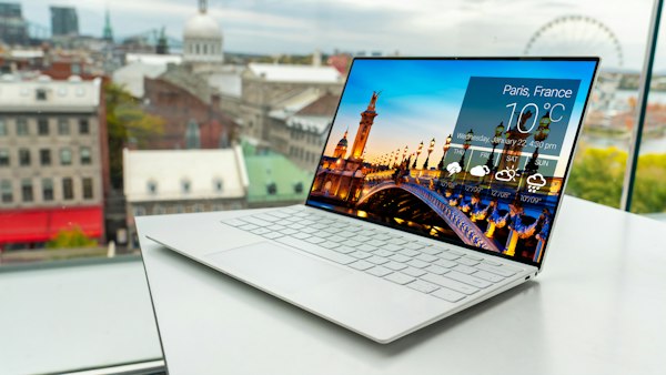 PalmOne on desk with laptop workspace